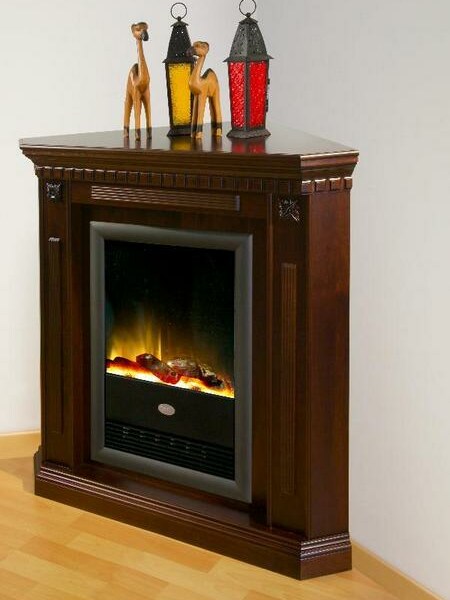 Der Eckkamin Global k63 ist ein echter Klassiker im Kolonialstil für Räume mit wenig Stellfläche
